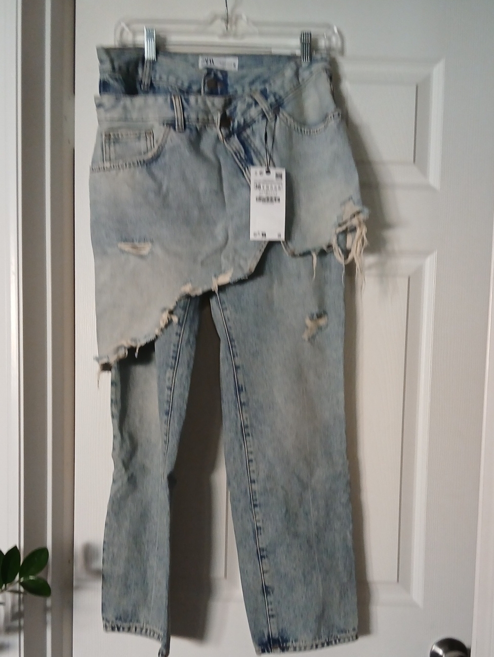 Zara Light Blue Distressed Boyfriend Jeans with Asymmetric Raw Hem